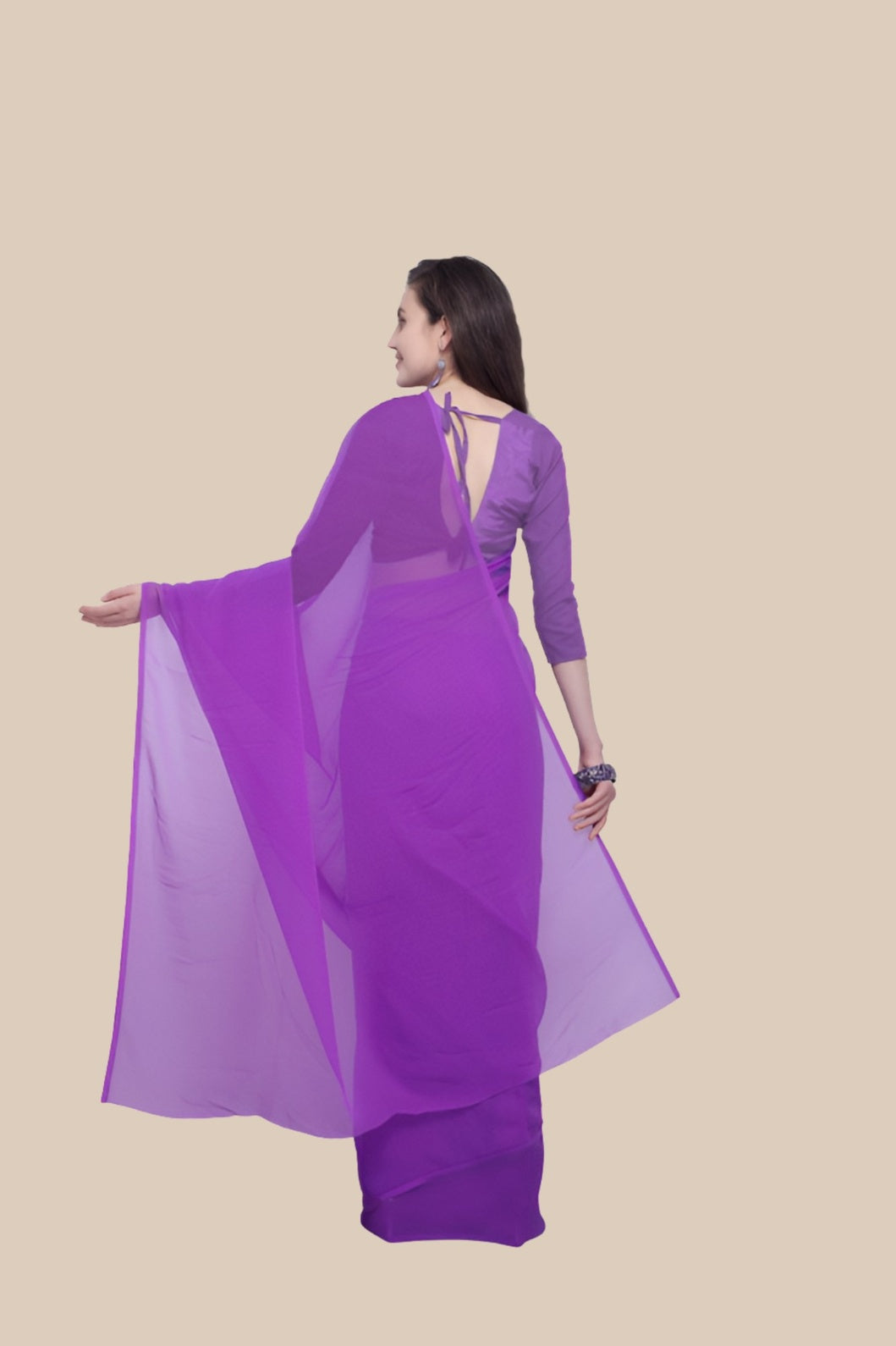 Rear studio view highlighting clean pallu drop