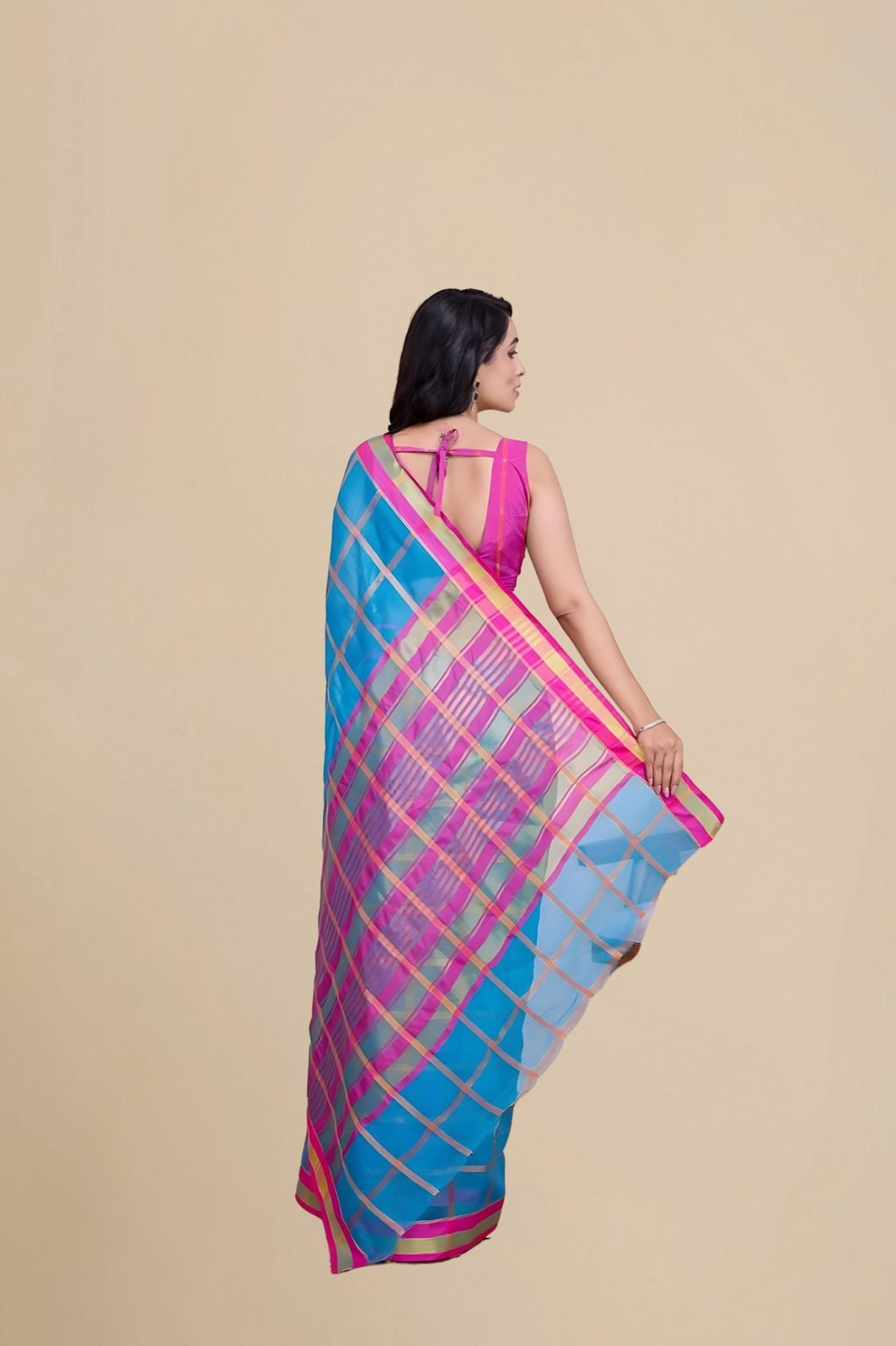 Back studio shot with blouse detailing and pallu clarity