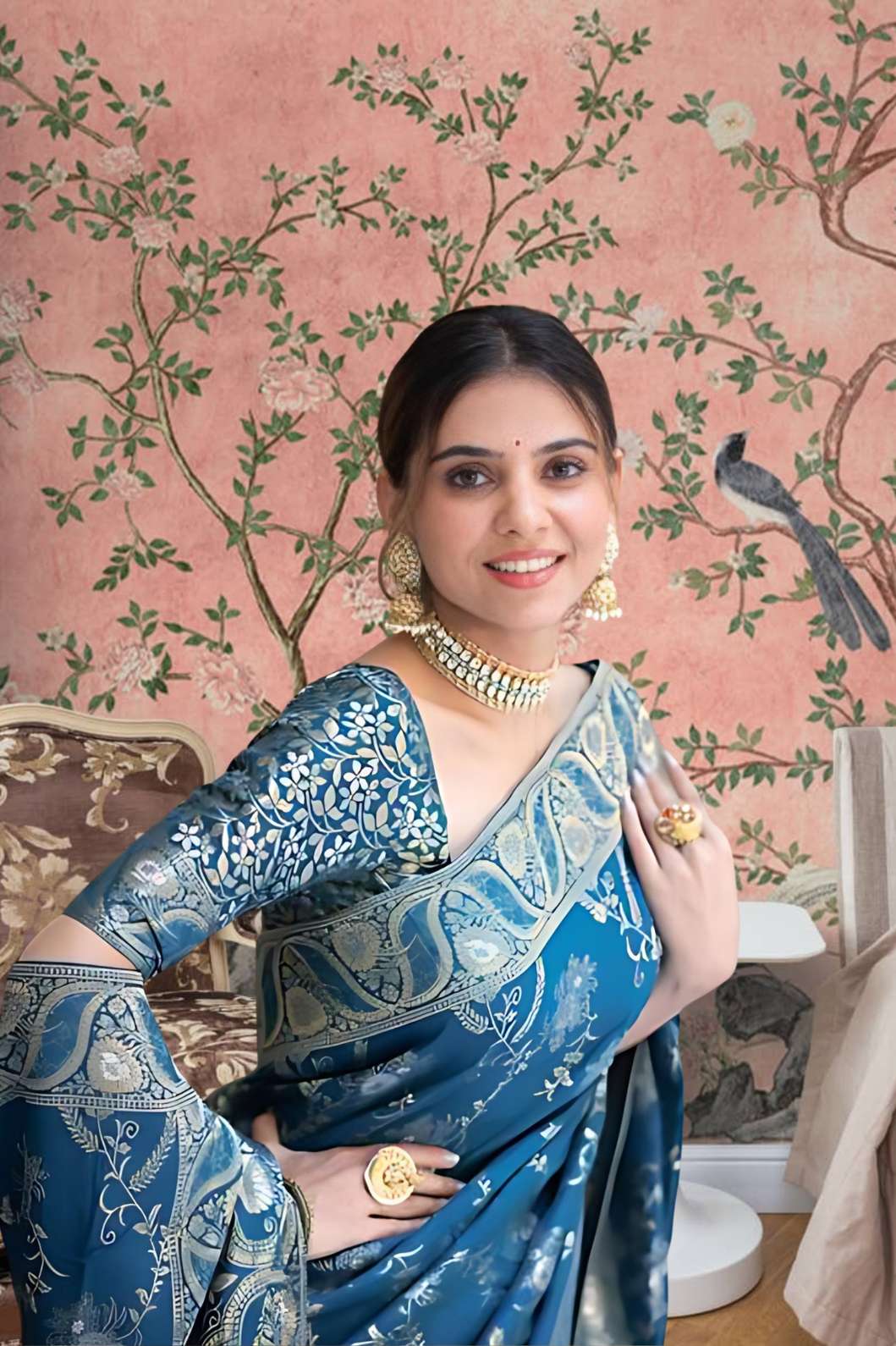 Front view showing Rama green silk saree glowing in palace lights
