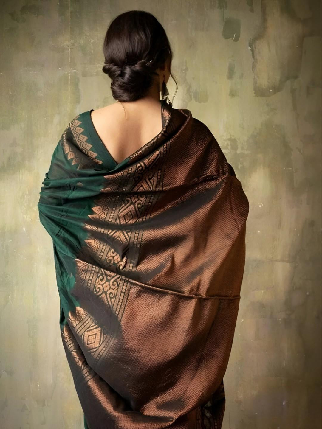 Saree pallu floating as model turns away from the camera