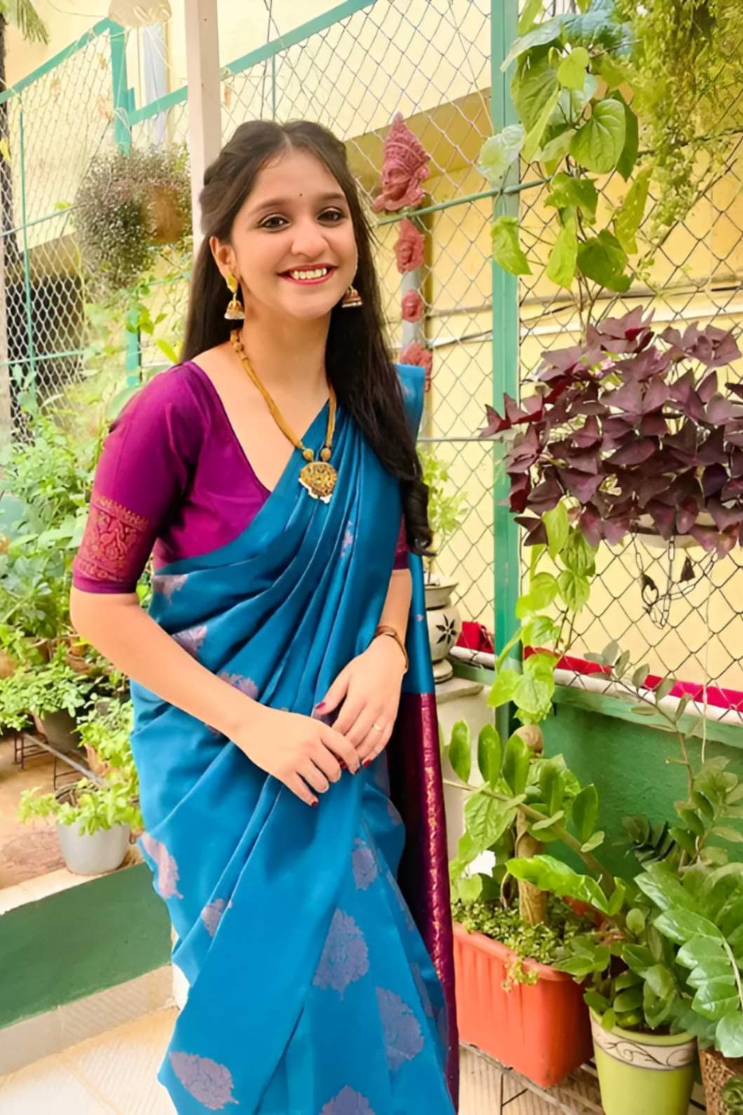 Front view of Rama green silk saree in outdoor setting