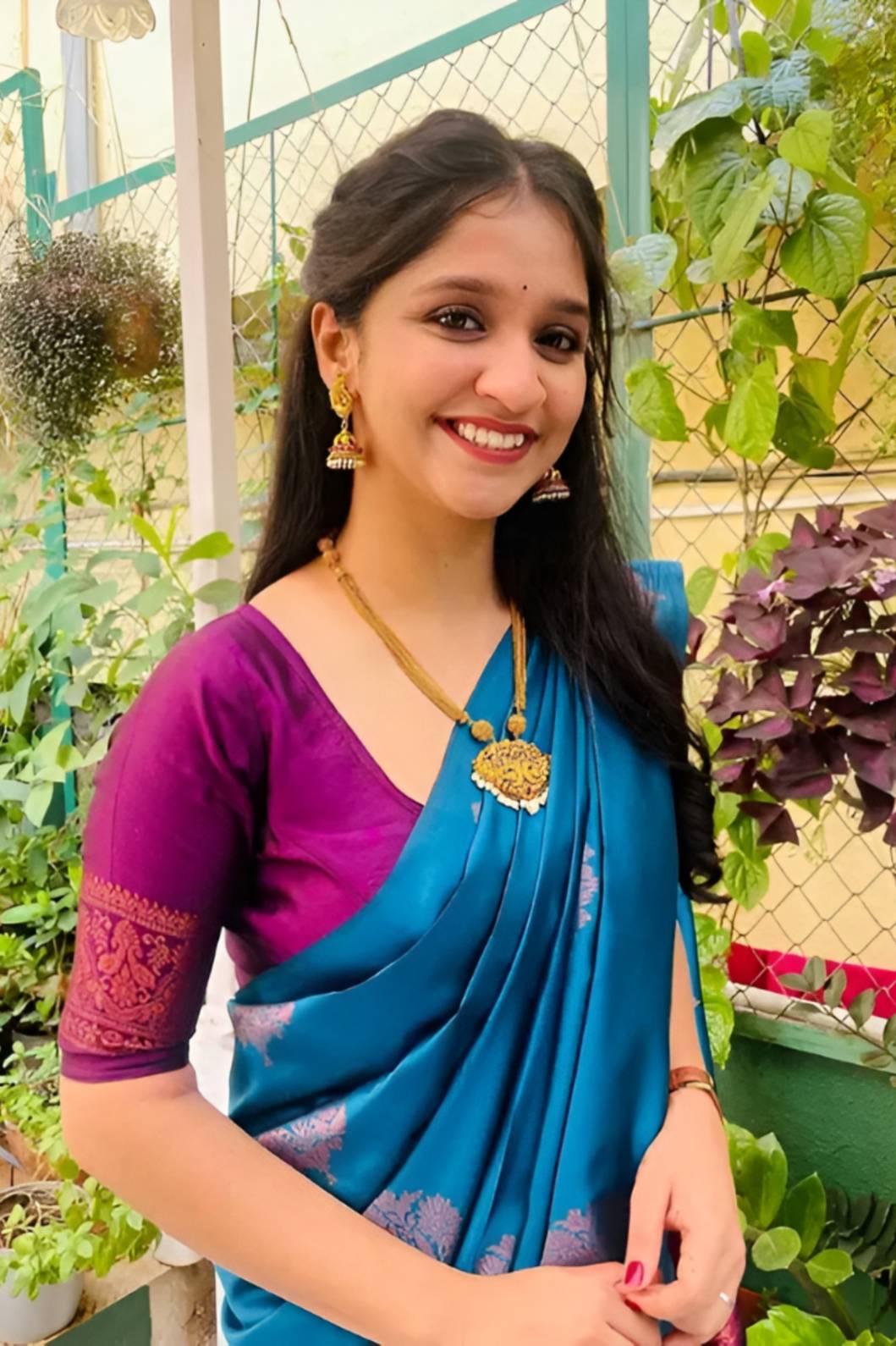 Front view of Rama green silk saree in outdoor setting
