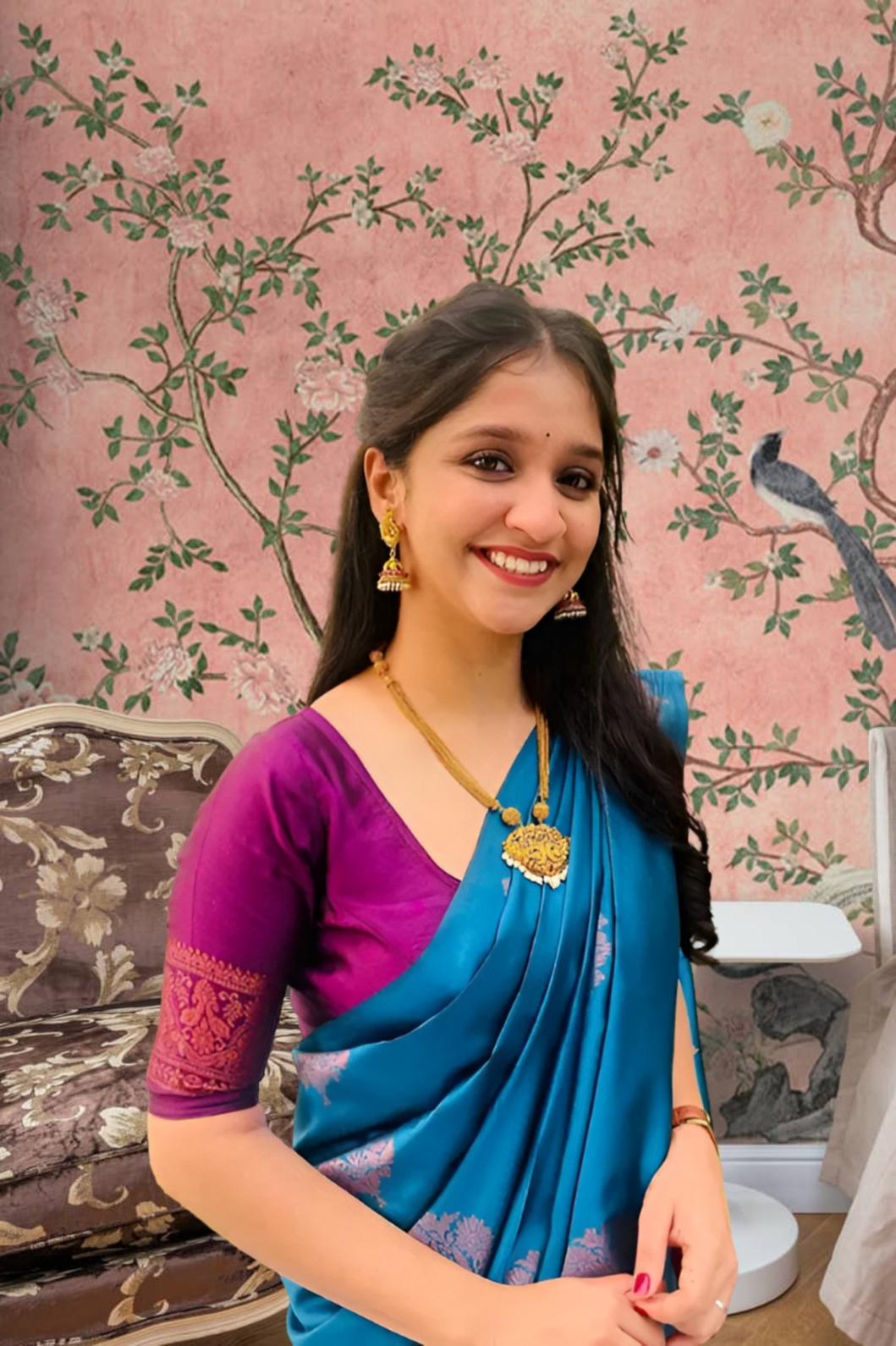 Front view of Rama green silk saree in royal setting