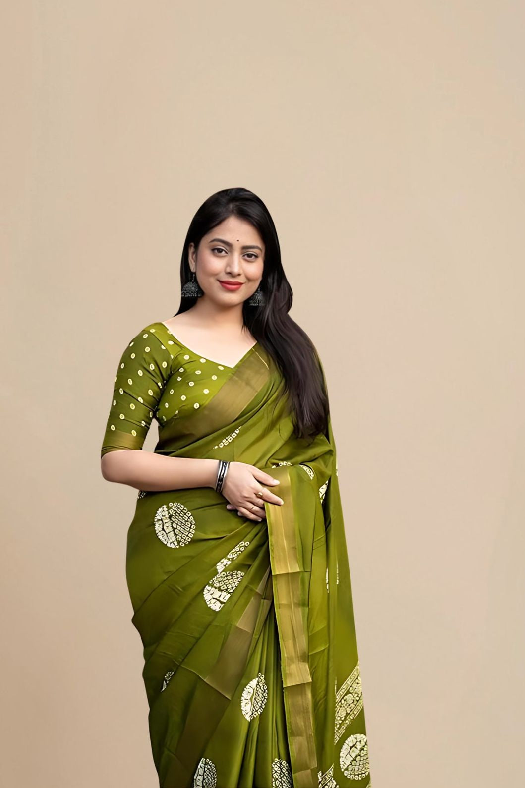 Studio front view of green saree showing structure and print balance