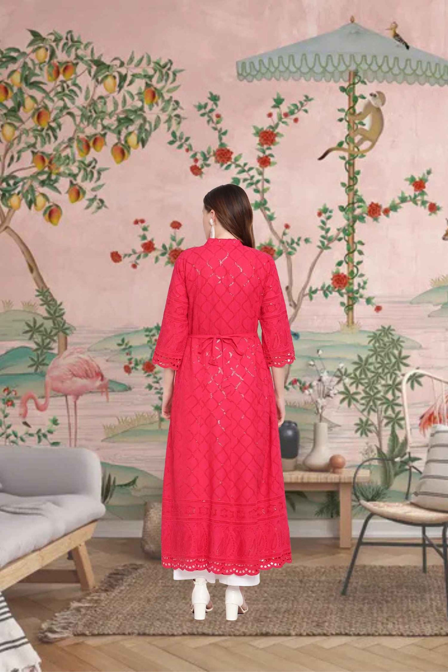 Rear pose showing embroidered dream vines