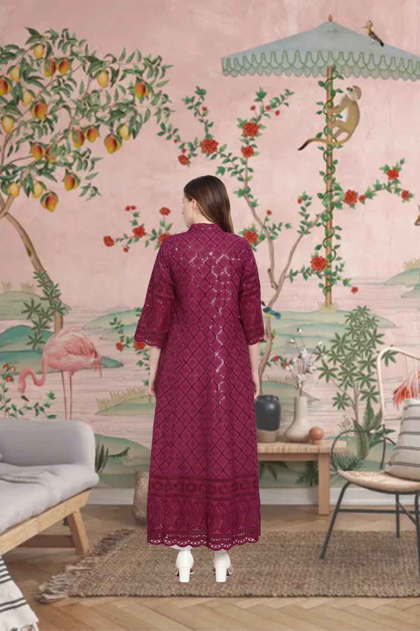 Rear view showing intricate embroidery glowing under the night sky