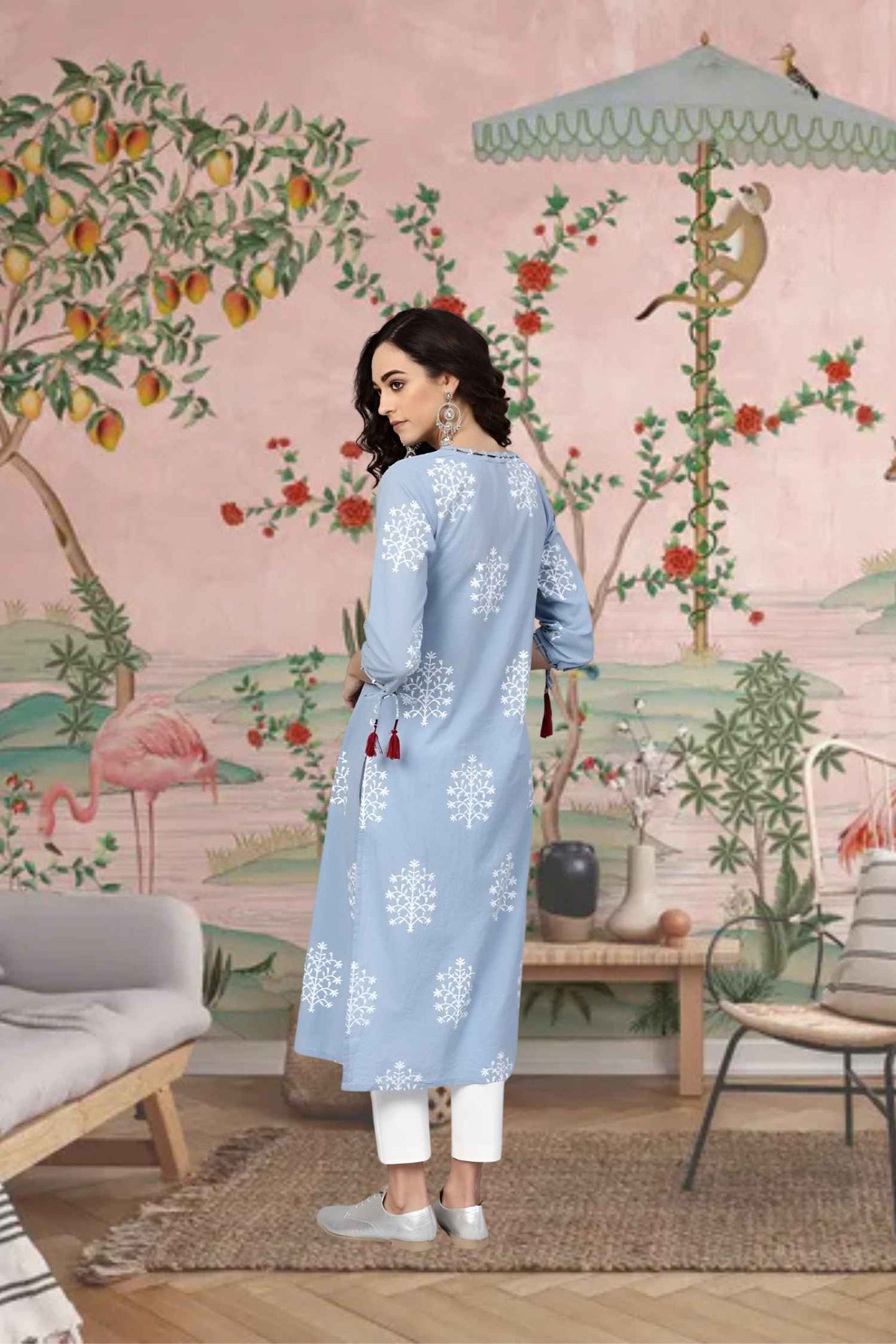 Back view with embroidery fluttering softly