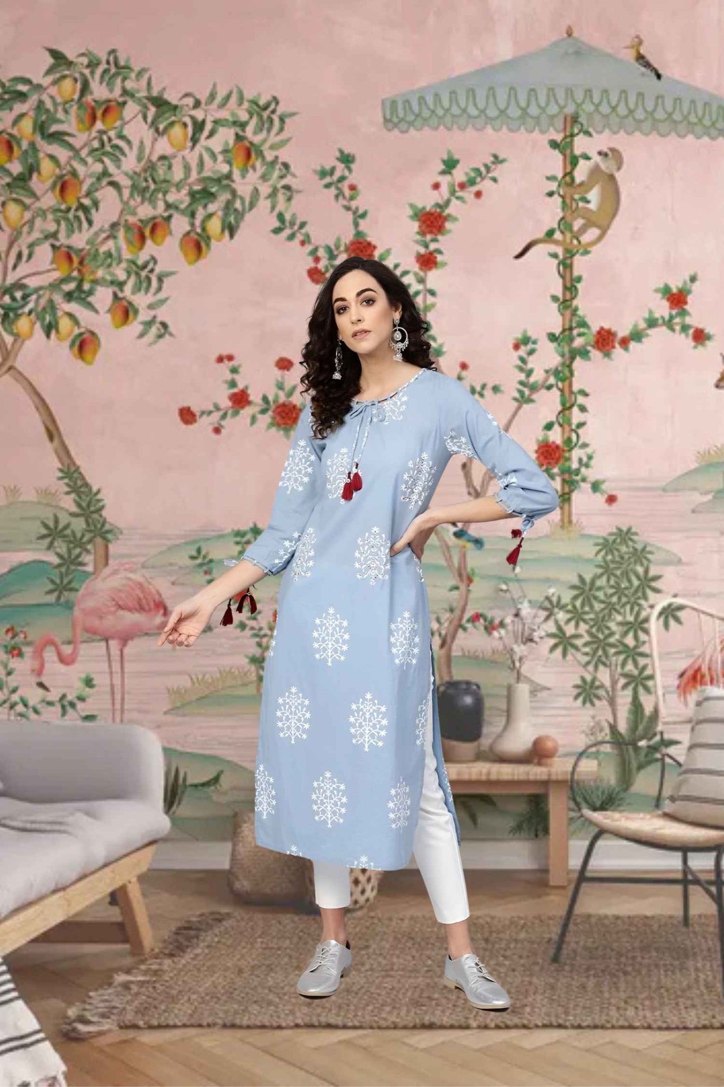 Front view: Blue kurti set against an open blue sky