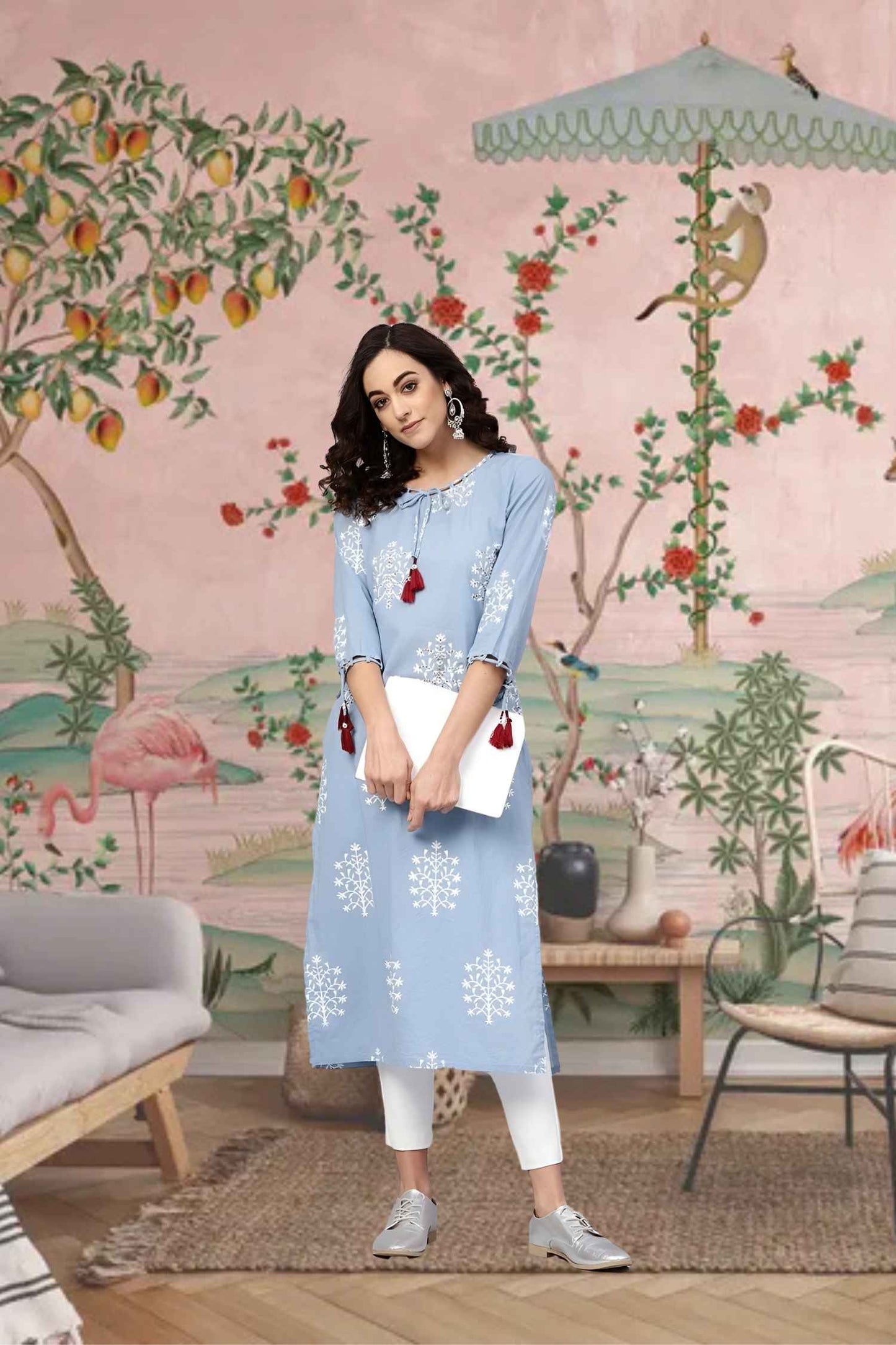 Front view: Blue kurti set against an open blue sky