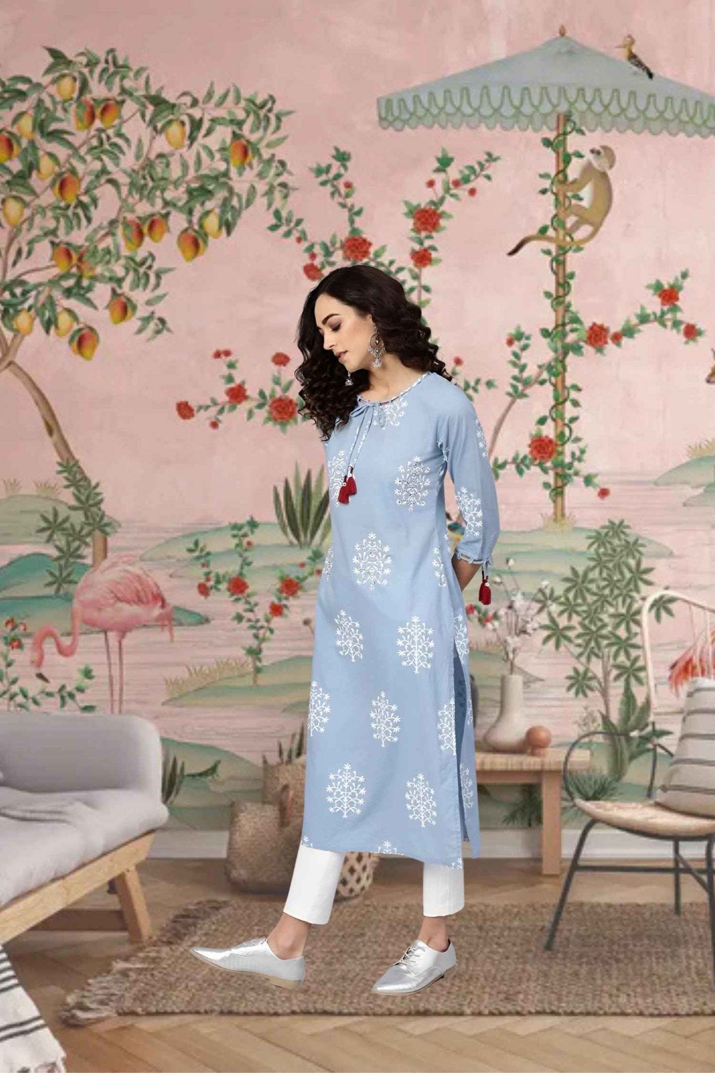 Side pose catching the gentle movement of the fabric