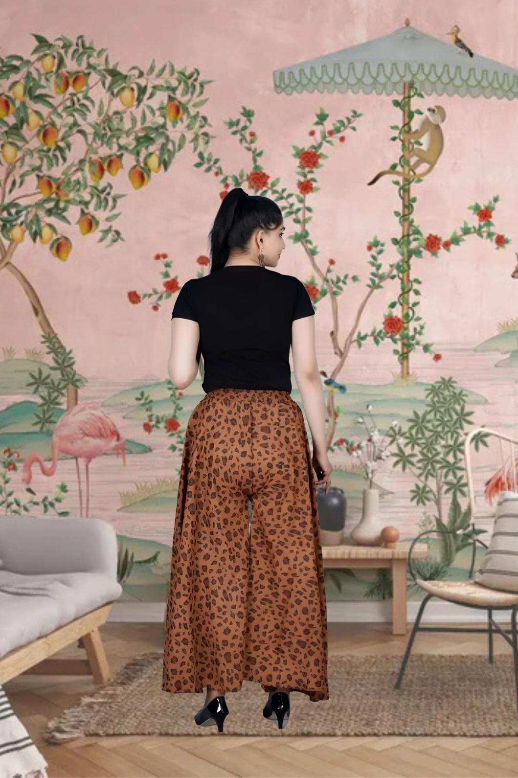 Back view showing fierce print of brown palazzo pants