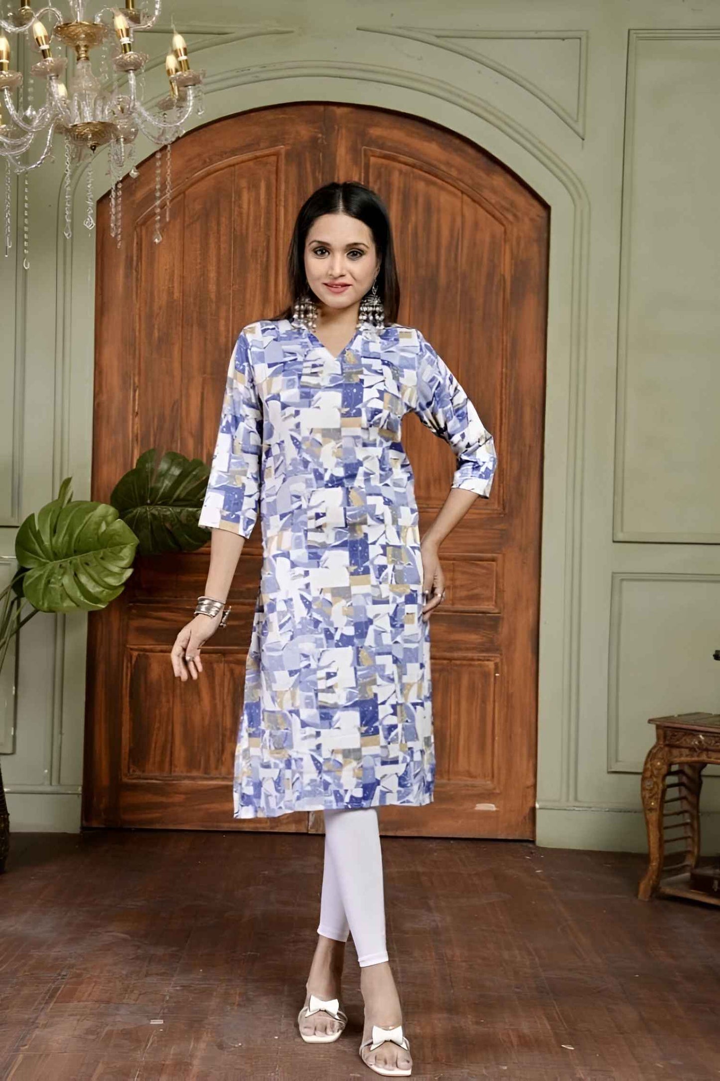 Front view: Blue kurti against a softly lit, ocean-like backdrop