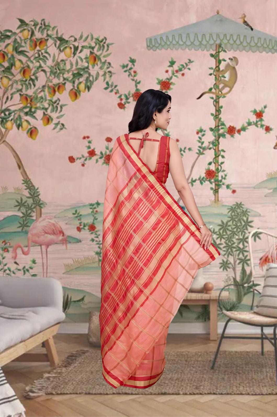 Back angle showing soft fall of pallu and subtle shimmer