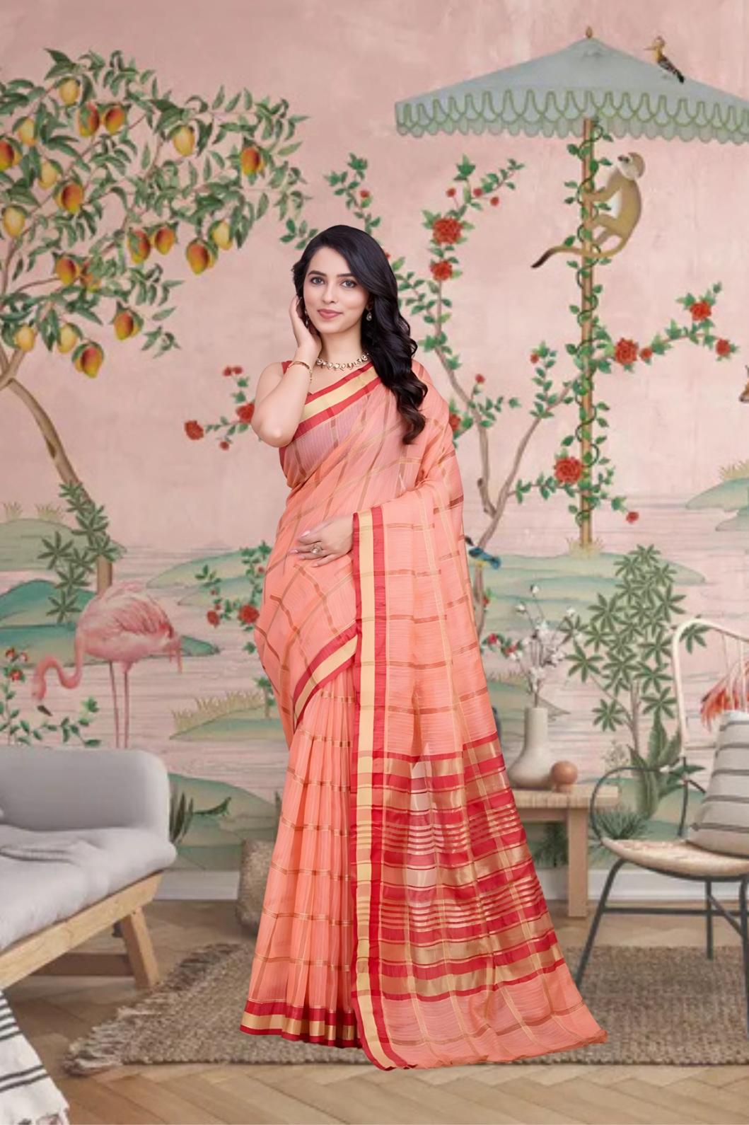 Front view of peach checkered saree glowing in royal ambiance
