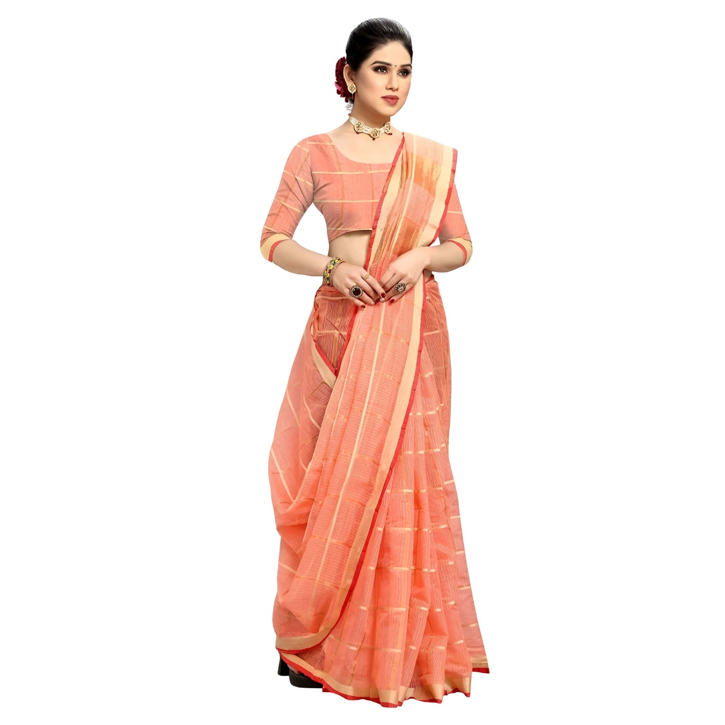 Model walking gracefully past temple archways, saree billowing, pinkish-peach hue glowing in sunlight