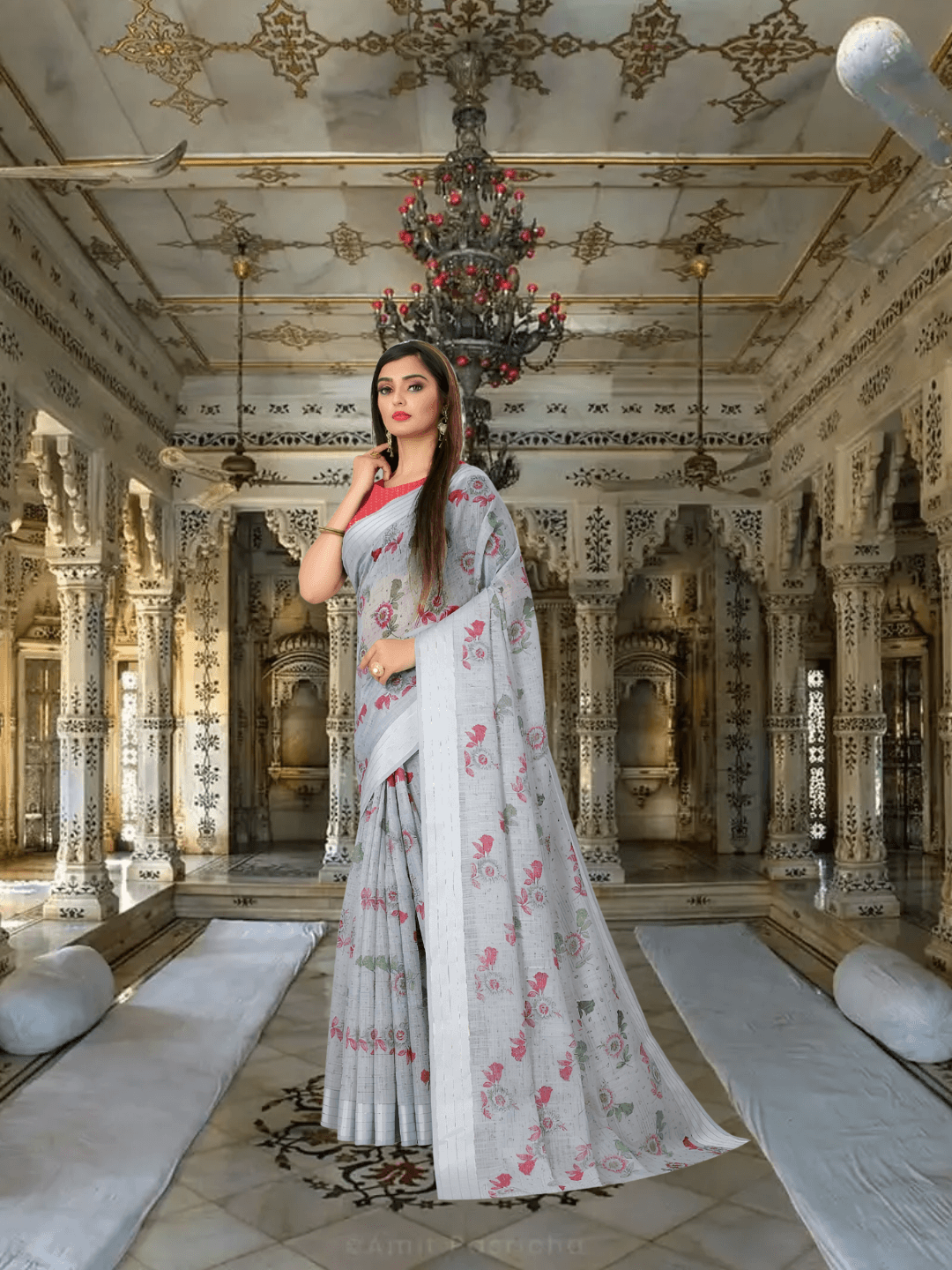 Elegant folds of grey cotton saree captured mid-frame in standing position
