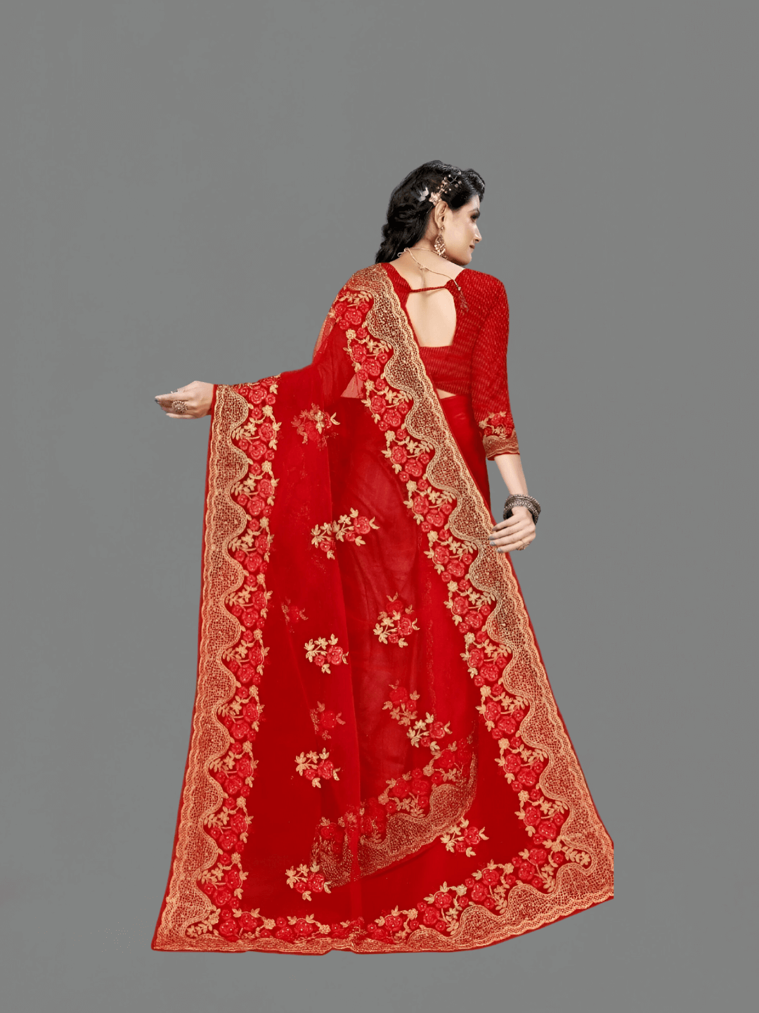 Technical drape test on grey, folds cascading at 122° like liquid rubies