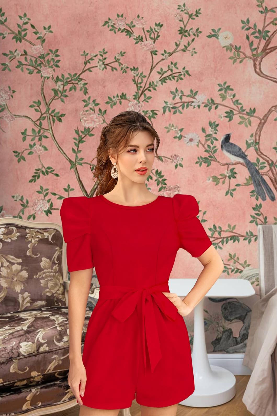 Model standing confidently in Crimson Covenant, red backdrop vibes