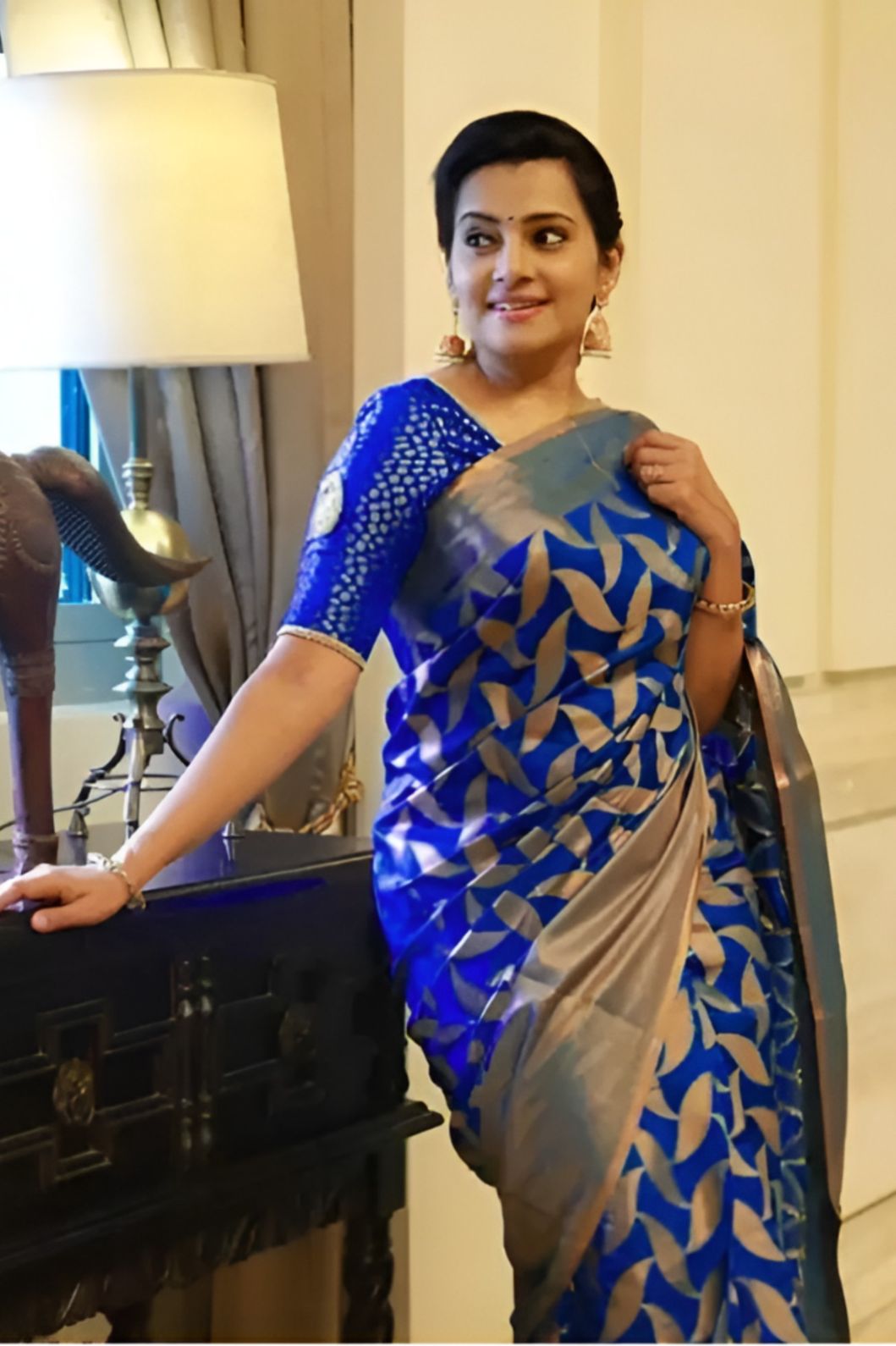 front angle of blue printed Litchi silk saree