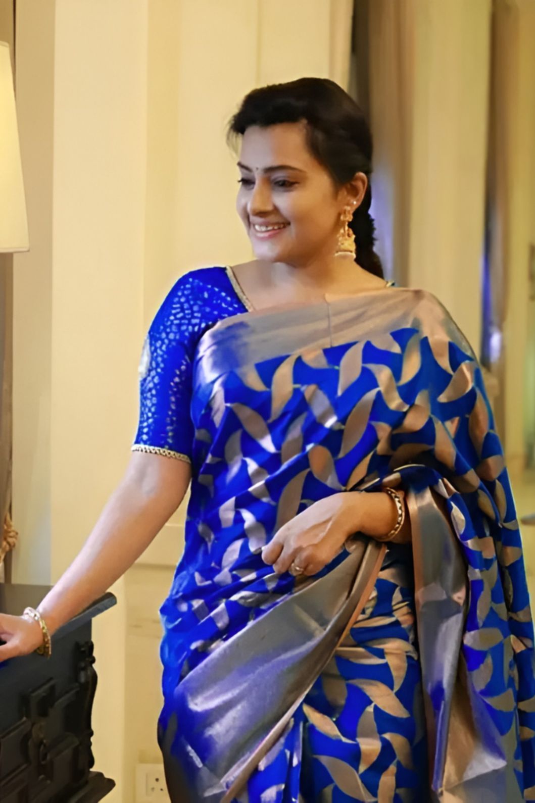 front angle of blue printed Litchi silk saree