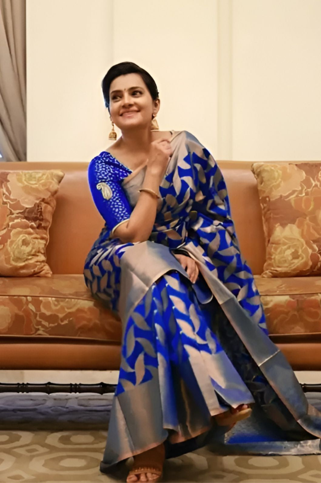 front angle of blue printed Litchi silk saree