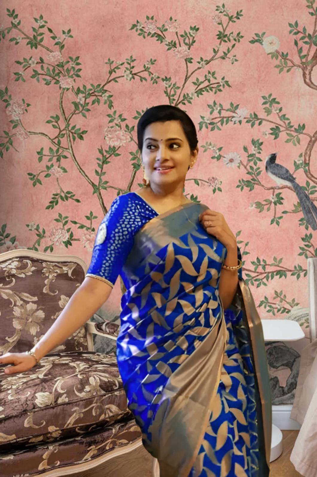 Front view of divine blue Litchi silk printed saree in temple-like palace setting