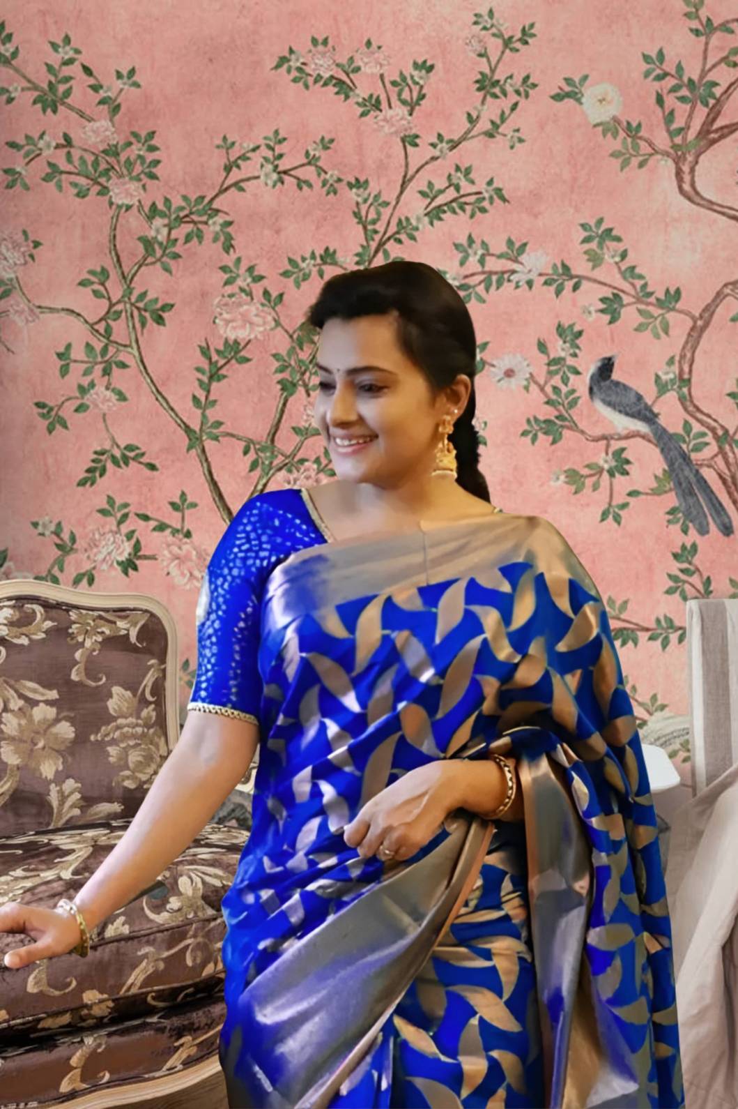 Front view of divine blue Litchi silk printed saree in temple-like palace setting