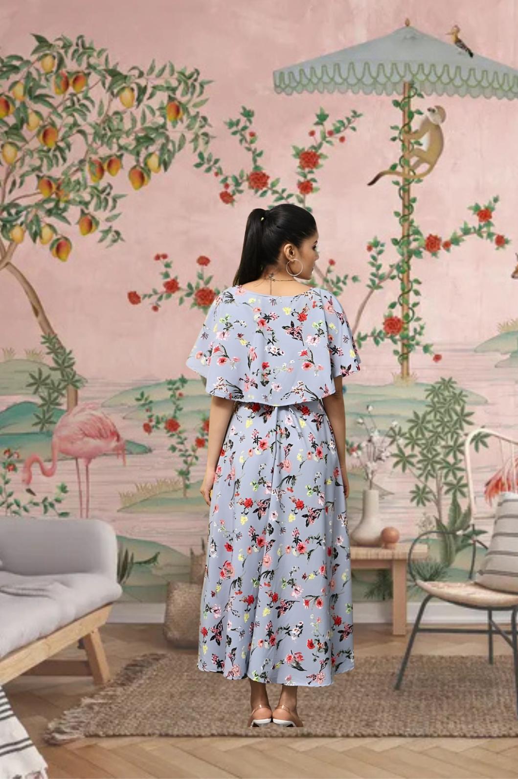 Back view of CELESTINA grey floral crepe gown in royal backdrop