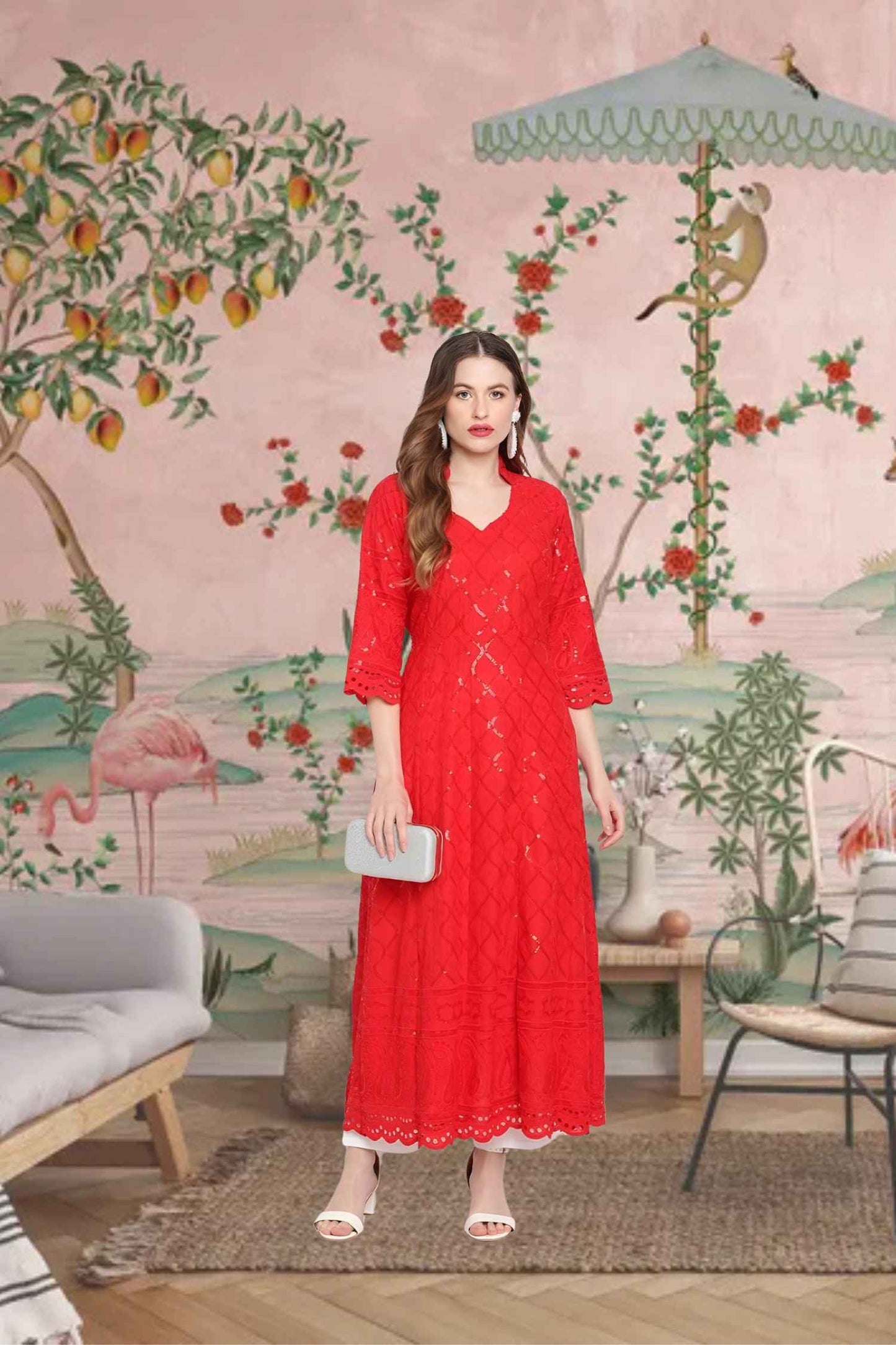 Front view: Scarlet kurti glowing against a firelit backdrop