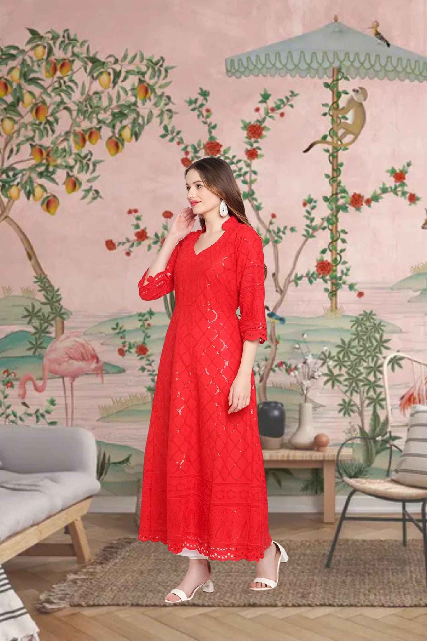 Profile view capturing the sweeping hemline and intricate details