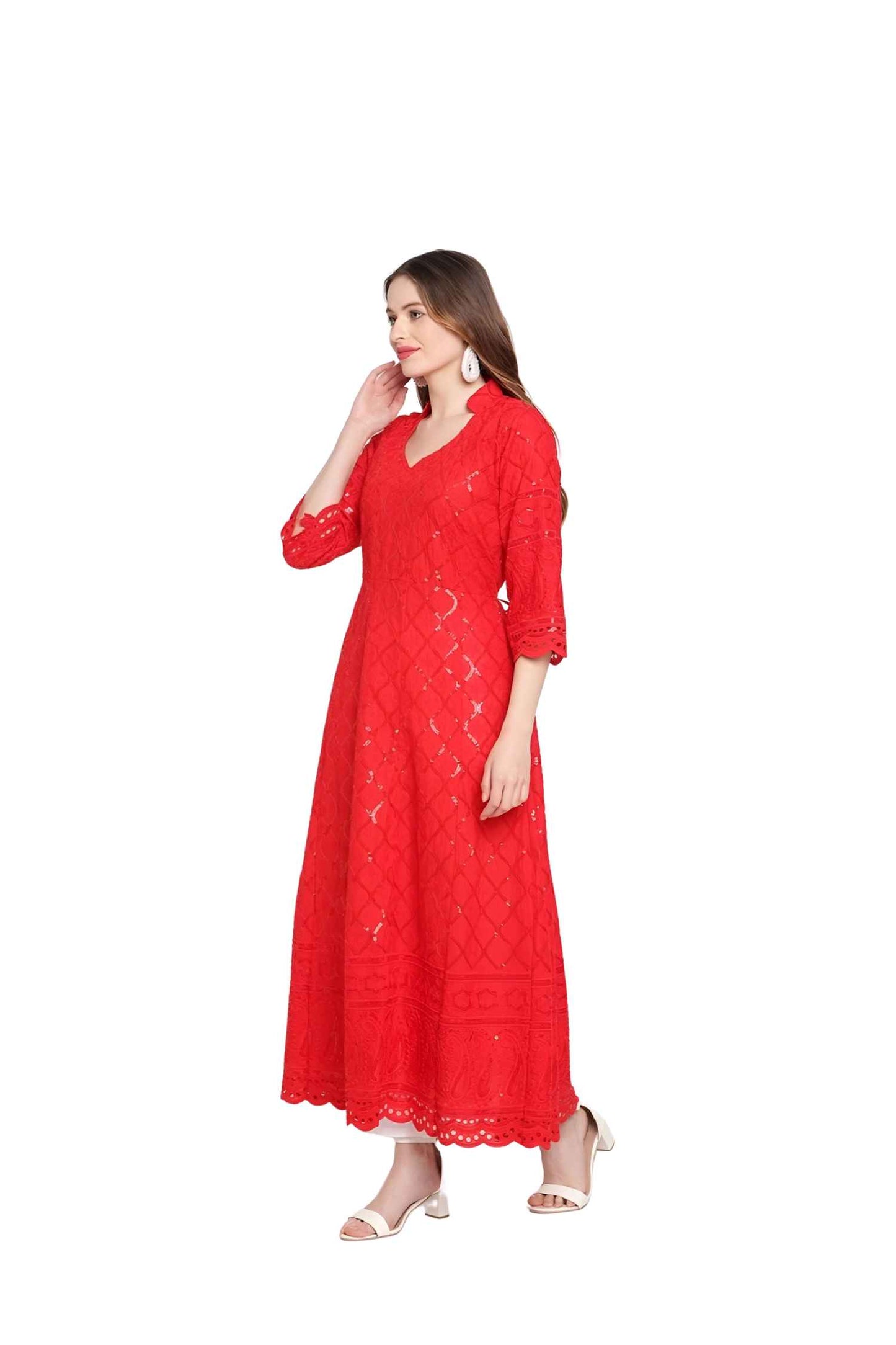 Silhouette showcasing the kurti’s striking flame-shaped drape