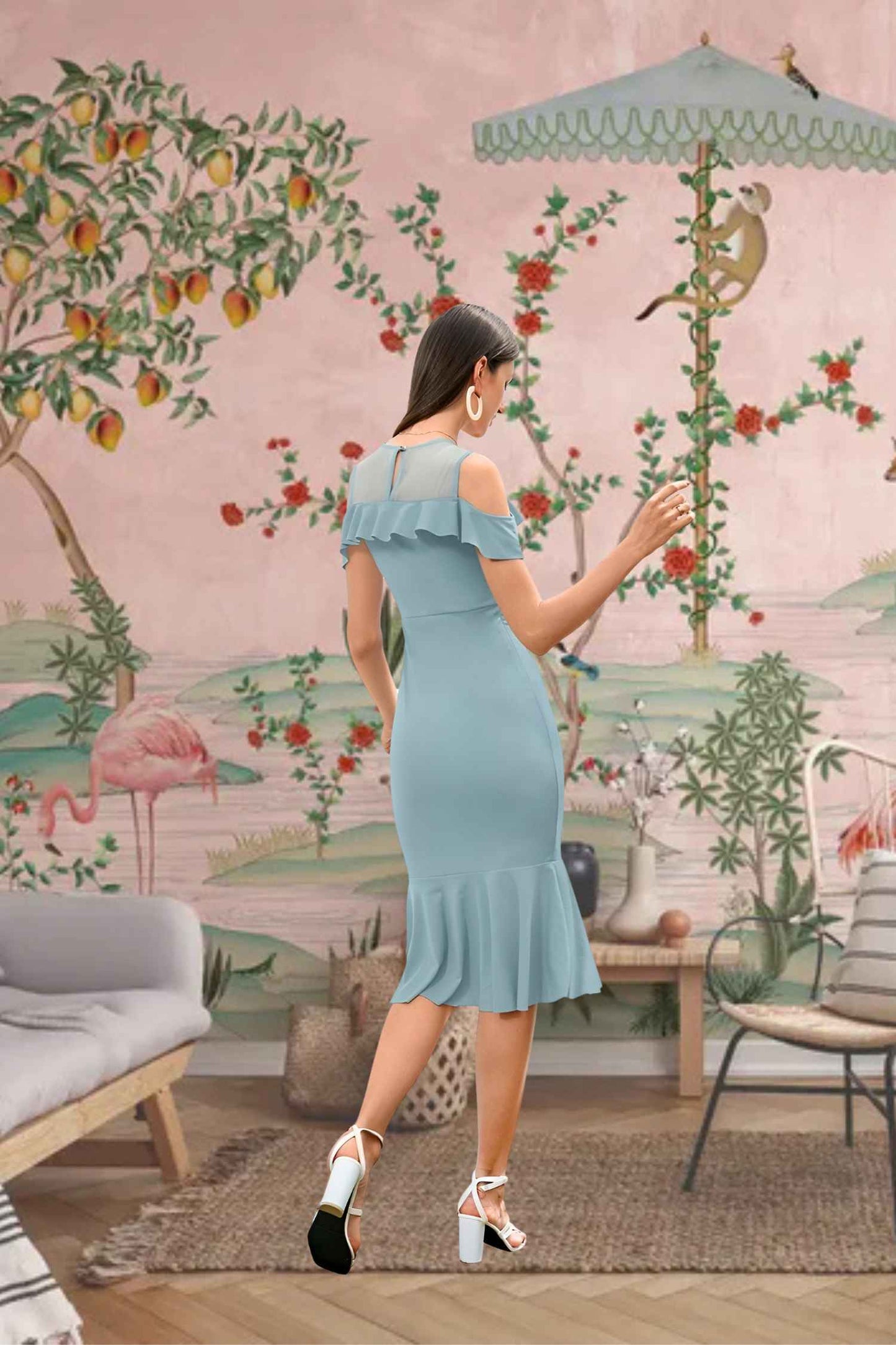 Back angle: How fabric clings then flares like a good punchline