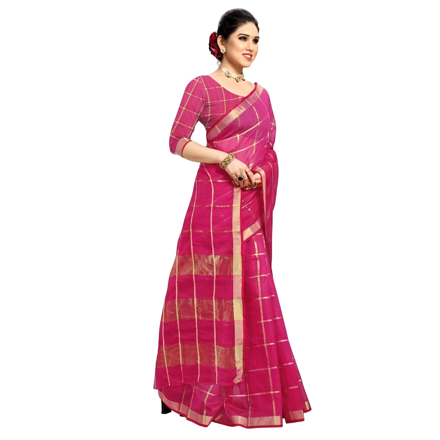 Studio shot of model in pink Kota Doria saree, golden checkered pattern catching light, red border forming delicate contrast