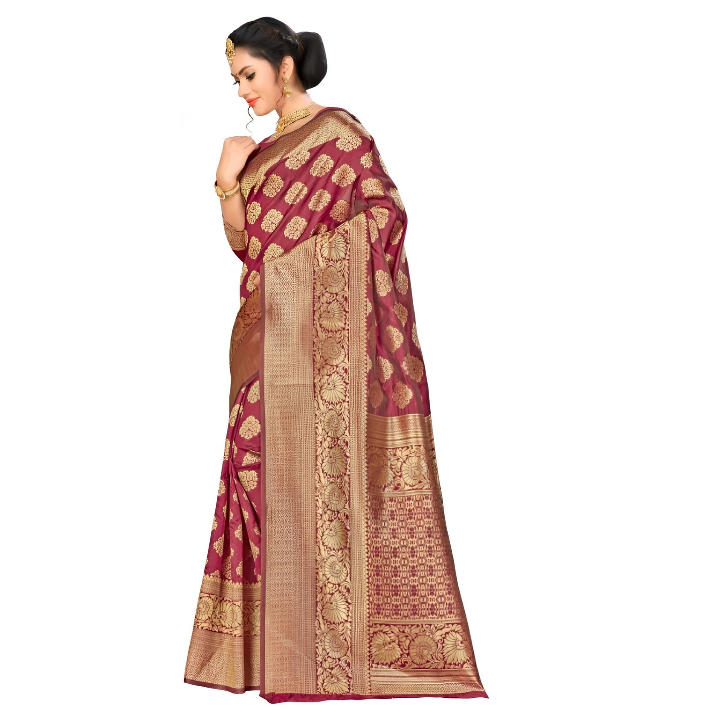 Focus on saree border with traditional gold zari work on maroon silk fabric