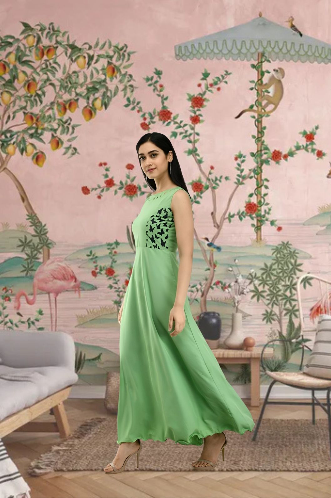 Right view of full-length sleeveless gown in green color