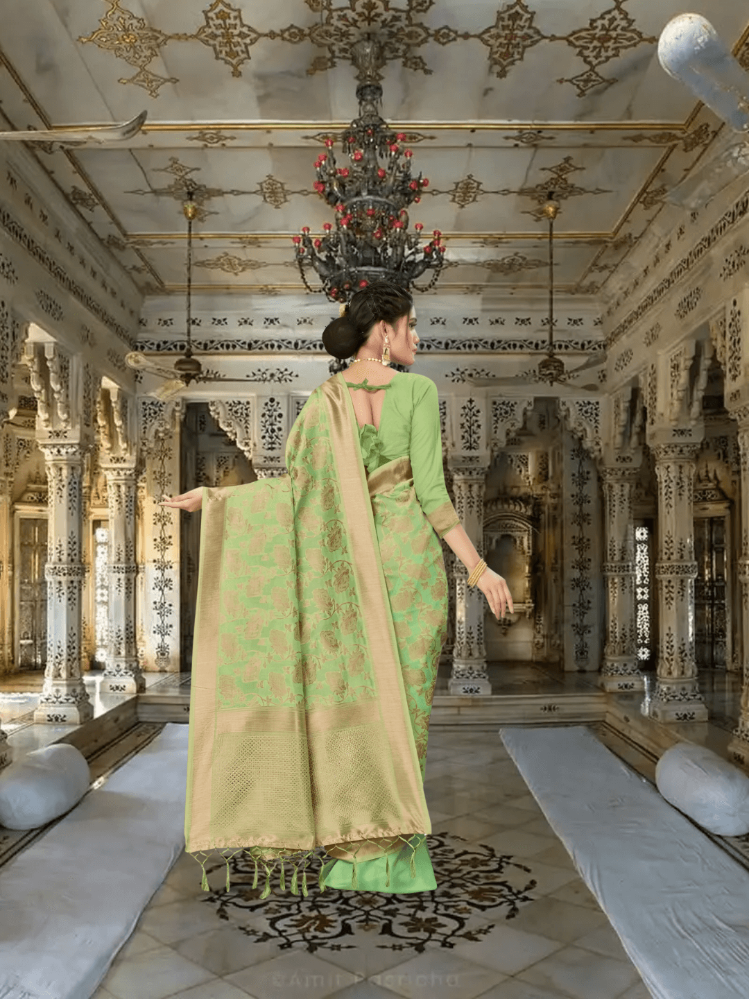 Pallu view of hand-spun cotton Banarasi saree with golden border in regal indoor setting