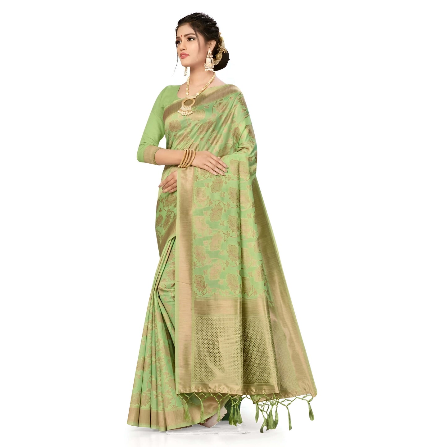 Pista green Banarasi cotton saree with golden borders draped against white background