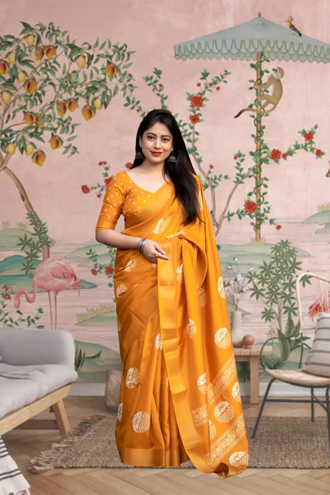 Front view of 💛 Hemavritta yellow cotton crape printed saree in a styled festive setup