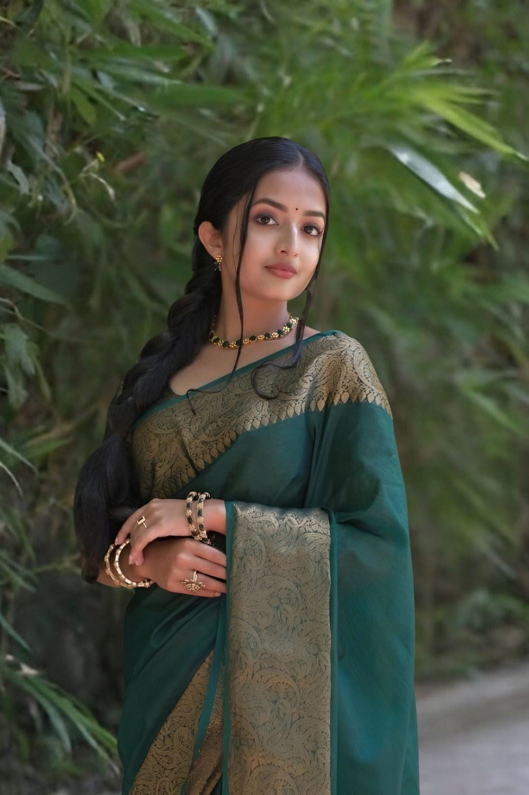 Front view of π Hiranyasnehi green Lichi silk saree draped gracefully β lifestyle background