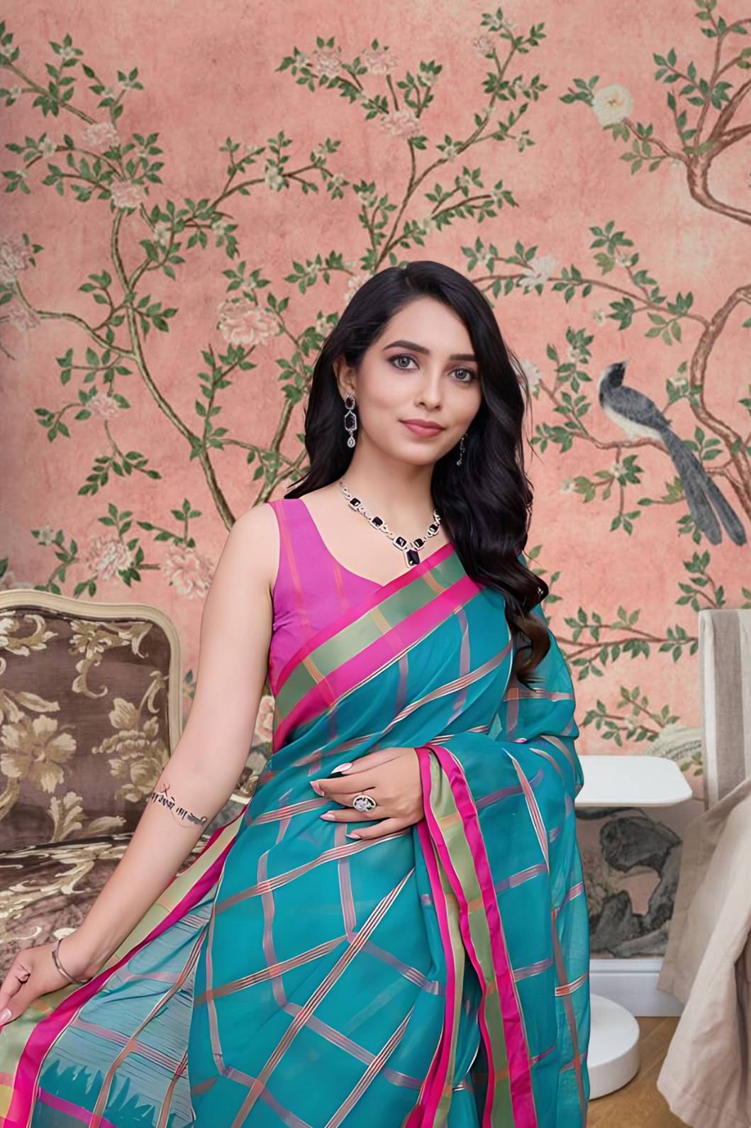 Front angle of Rama green saree glowing in traditional palace interior