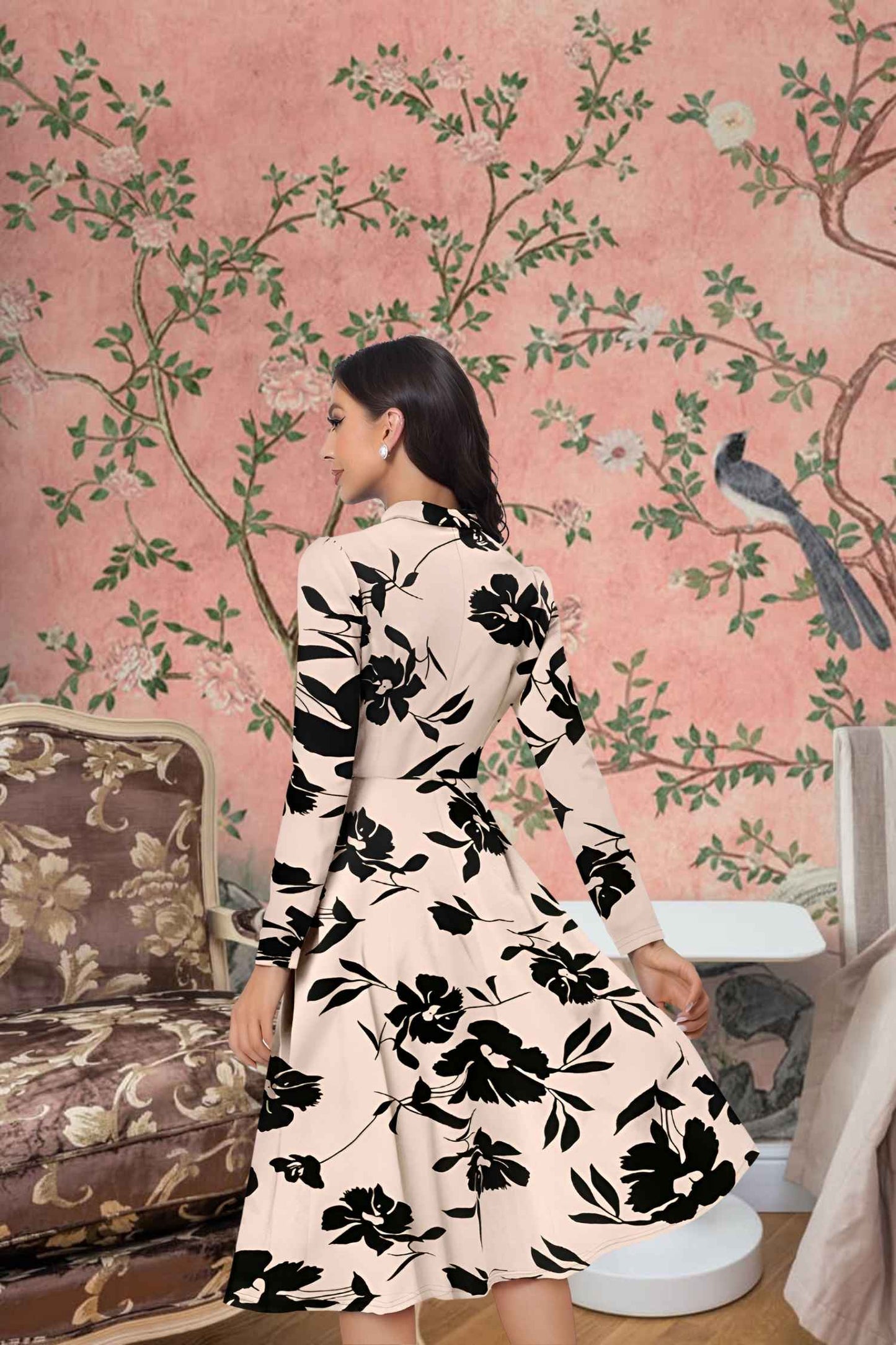 Rear view of cream printed V-neck dress