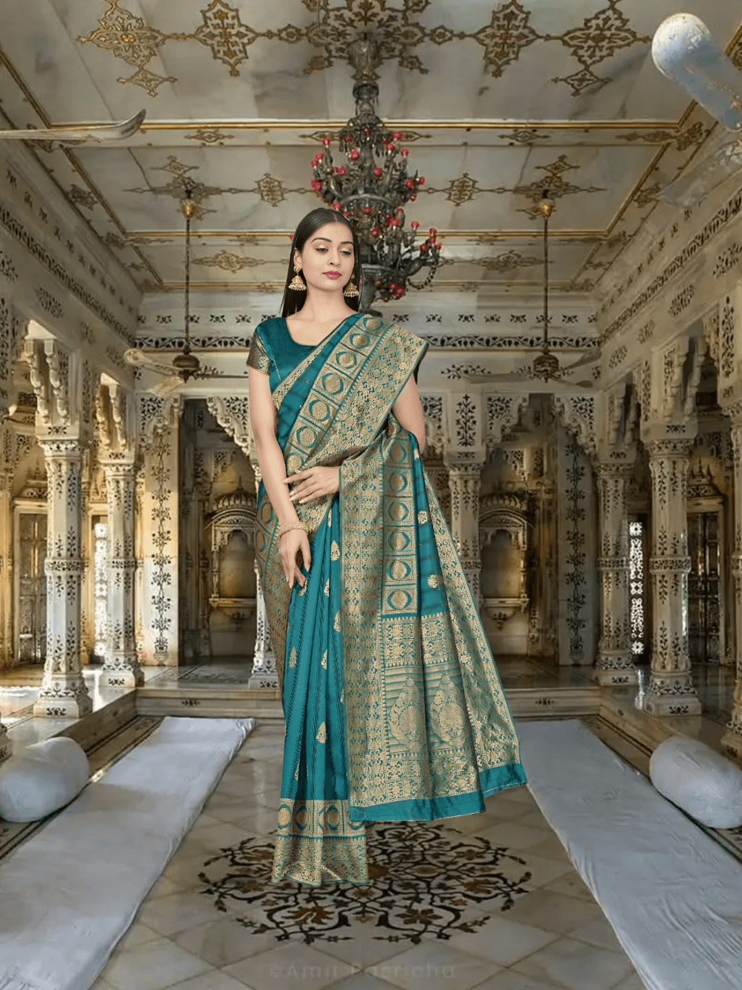 Emerald saree in monsoonal light, gold borders cutting like lightning through vines