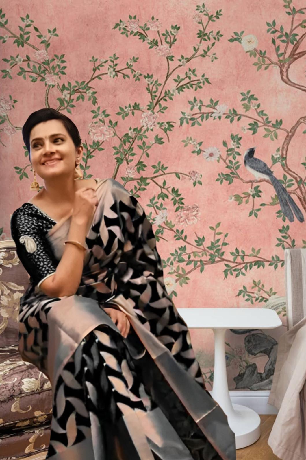 Front view of black Litchi silk printed saree in royal setting