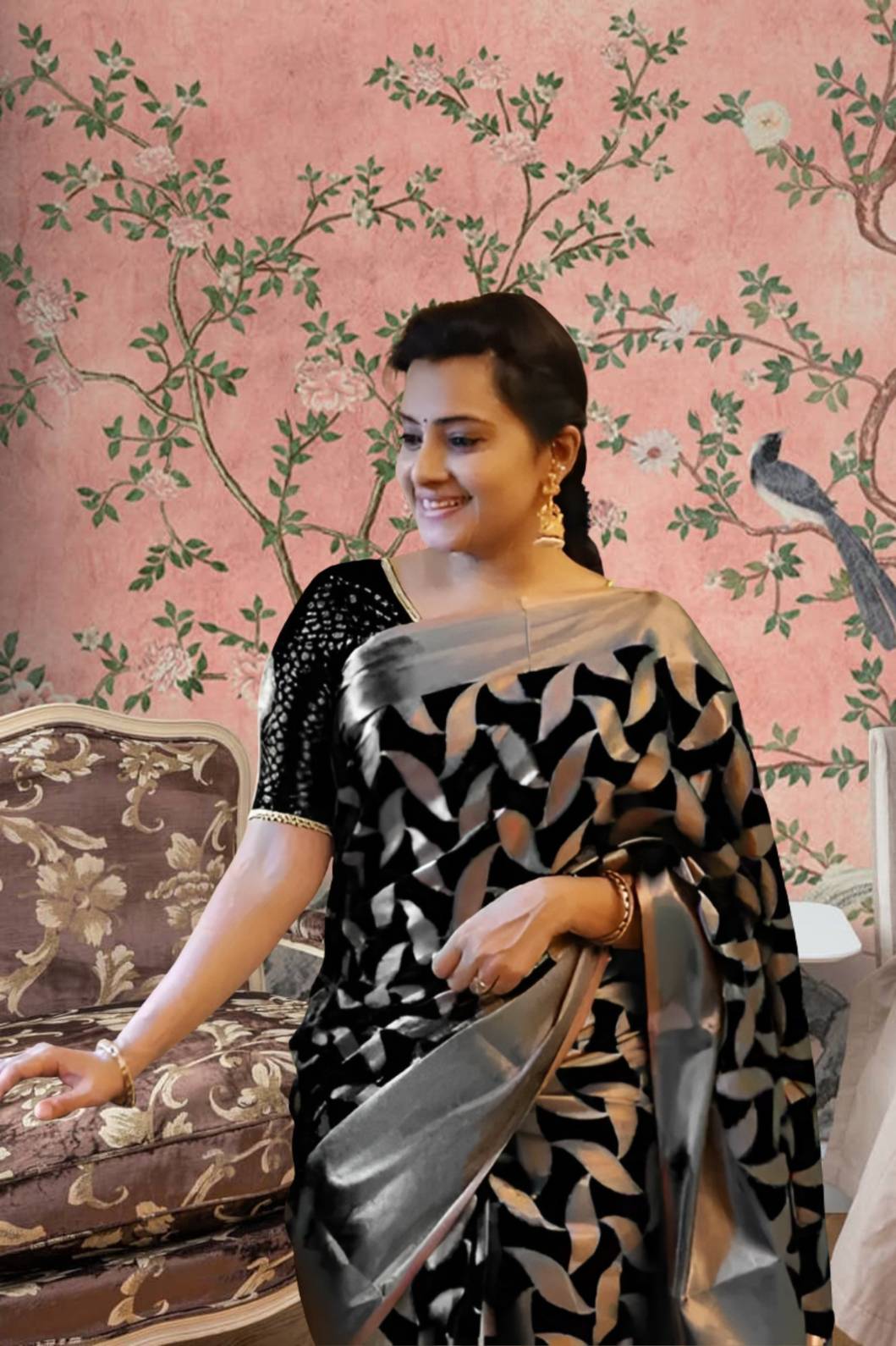 Front view of black Litchi silk printed saree in royal setting