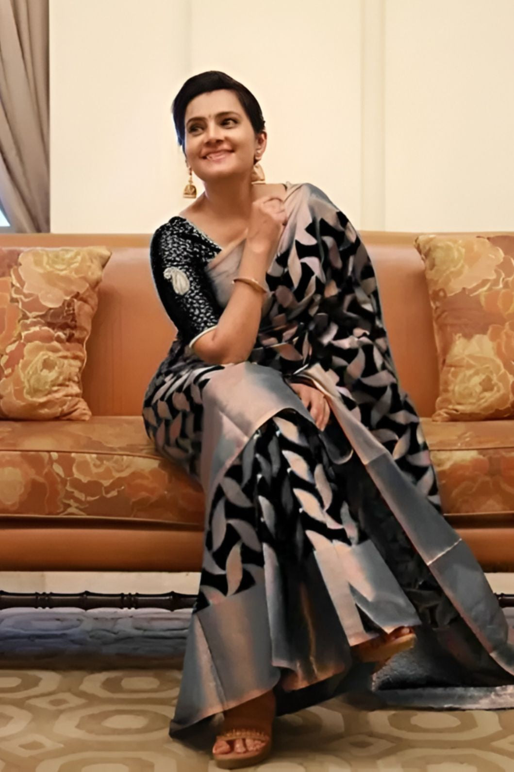 Studio front view of printed black Litchi silk saree