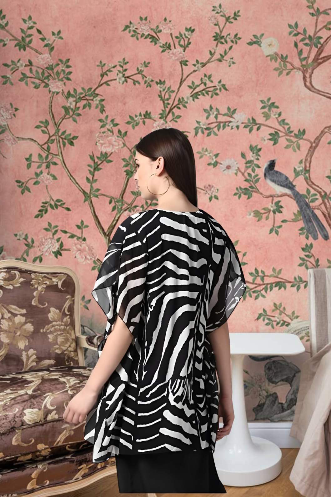 Back side of CELESTINA black short sleeve shrug