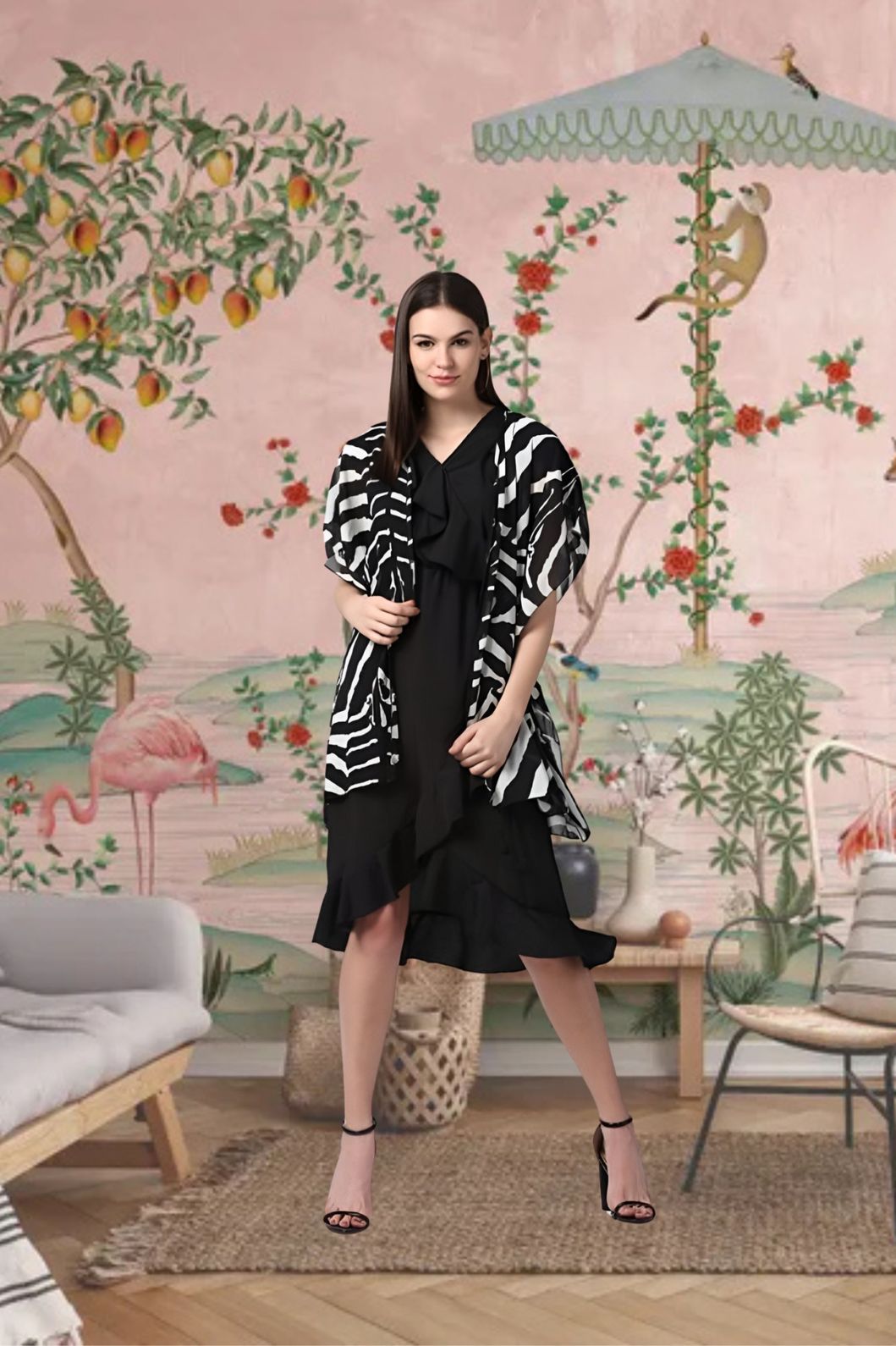 Front view of black printed women’s shrug by CELESTINA