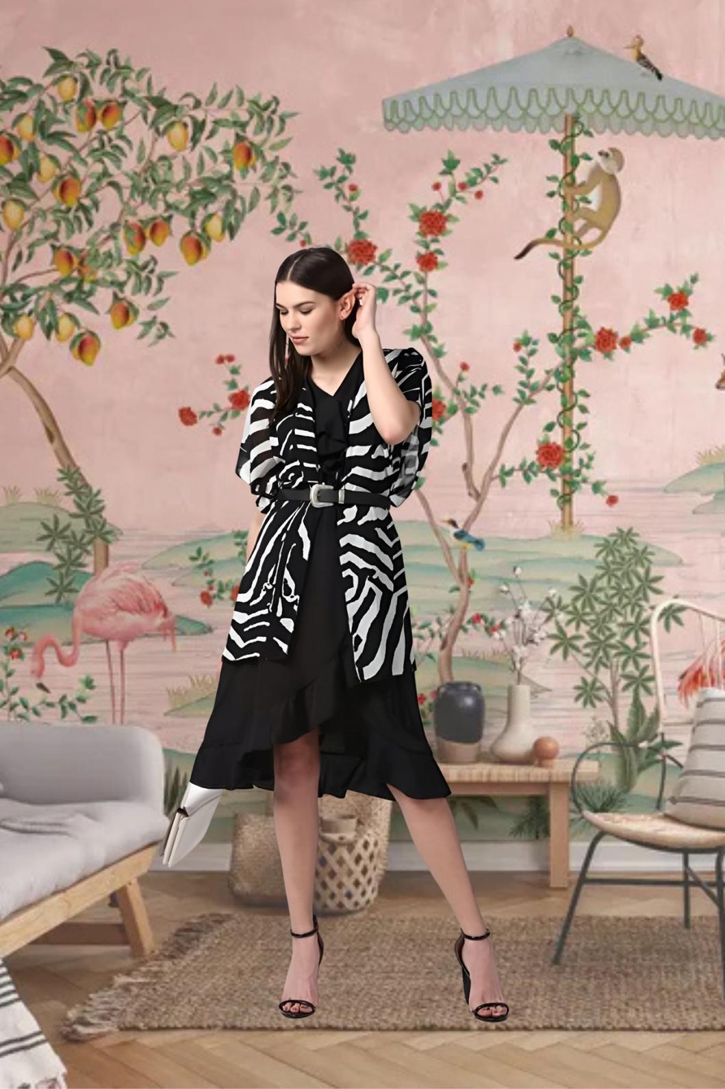 Front view of black printed women’s shrug by CELESTINA