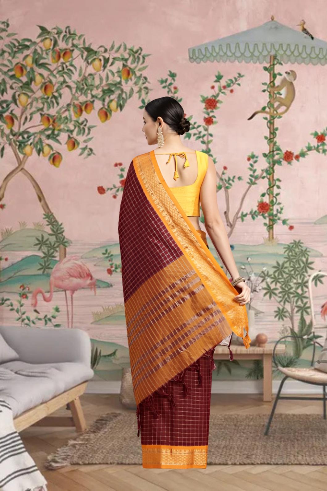 Back view showing pallu fall with yellow-golden borders