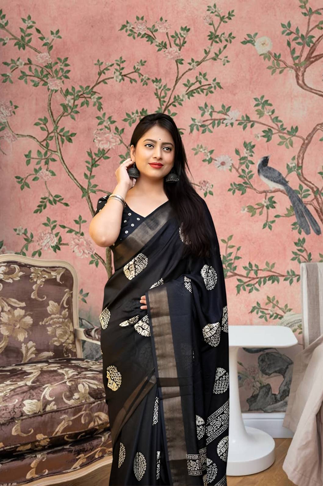 Front view of 🖤 Kaatyaayani black printed cotton crape saree – styled in ethnic setting